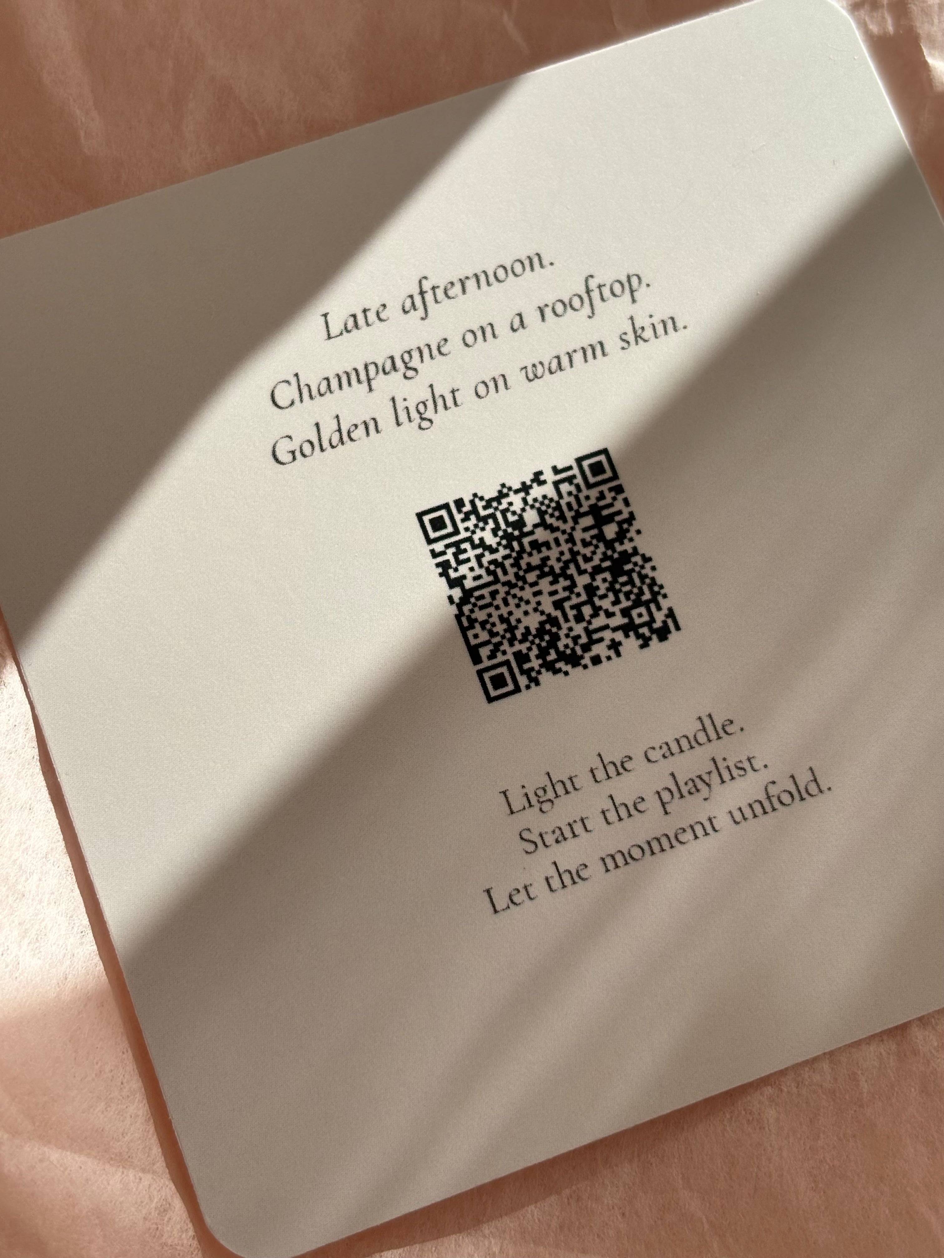 Handcrafted perfume-inspired candles with curated playlists